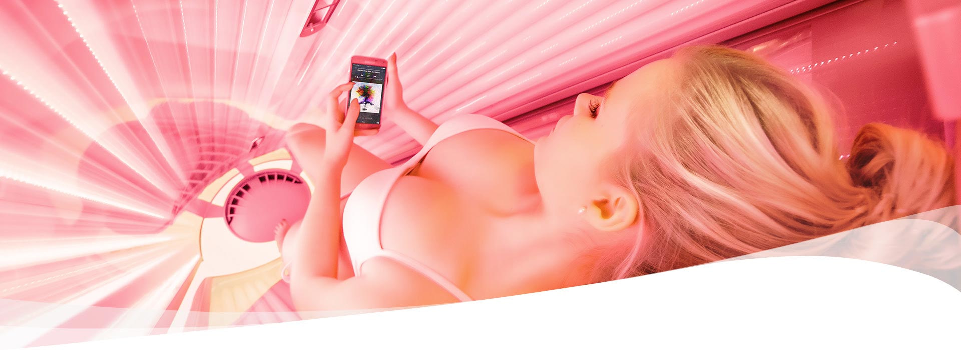 woman in Dr. Muller omega red light therapy device